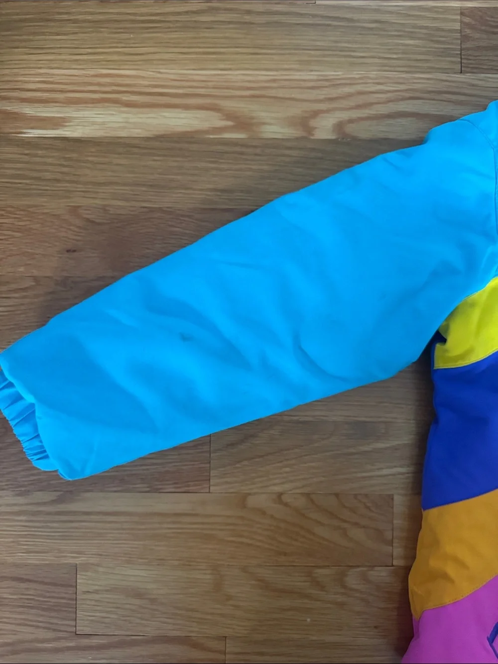 Obermeyer Kids Ski Jacket in Turquoise, Yellow & Pink